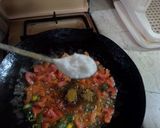 A picture of step 13 of Tawa Bhindi.