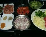 A picture of step 2 of Chicken mix veggies with white rice.