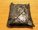 A picture of step 7 of Cooking Papa's Original Onigirazu.