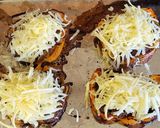A picture of step 9 of Curried potato filled peppers with cheese.