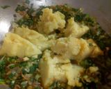 A picture of step 13 of Aloo Ka Bhurtha.