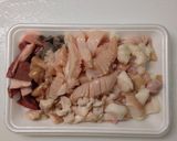 A picture of step 1 of Authentic Hakata-Style Soy Sauce Motsu Nabe at Home.