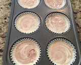 A picture of step 6 of Fudge Swirled Oreo Bottom Cheesecake Cupcakes.