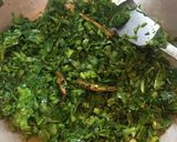 A picture of step 2 of Bengali style Shorshe Saag / Mustard Greens.