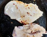 A picture of step 2 of My fried Salt and Pepper seasoned Chicken on a bun. 🥰🥰🥰.