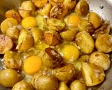 A picture of step 3 of Huevos Rotos (Broken Eggs).