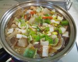 A picture of step 2 of Hearty Vegetable Kenchin-jiru Soup.
