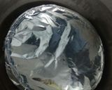 A picture of step 10 of Eggless Caramelized Bread Custard.