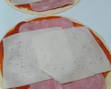 Foto del paso 2 de la receta: Mini rollitos de pizza