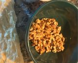 A picture of step 6 of Easter Rings Filled with Hazelnut Spread and Walnuts.