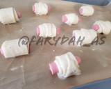 A picture of step 5 of Sausage rolls.