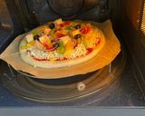 A picture of step 7 of Cheesy Veg Pizza.