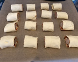 Foto del paso 8 de la receta: Hojaldrinas de salchicha y queso rebozadas en maíz frito