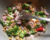 A picture of step 5 of Spicy Tawa Idli.