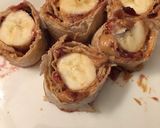 A picture of step 5 of Peanut Butter Banana Roll Up.