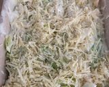 A picture of step 3 of Potato, cauliflower, cabbage cheesy bake.