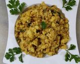 A picture of step 8 of Aloo ka bharta.