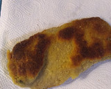 Foto del paso 2 de la receta: Milanesa a la napolitana con fritas