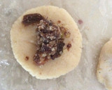 A picture of step 6 of Khoya Modak stuffed with Dates&Nuts.