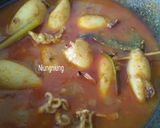 Foto langkah ke 4 dari resep Gulai Cumi isi Tahu Telur.