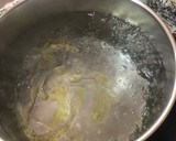 Foto del paso 6 de la receta: Spaghetti al nero di seppia con gulas, gambas y calamares