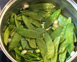 A picture of step 1 of Lemon sole, capers, prawns and mangetout.