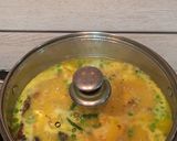 A picture of step 8 of Moong Dal with peas and cauliflower.