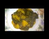 A picture of step 11 of Aloo palak.