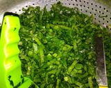 A picture of step 1 of Lahsuniya Dal Palak.