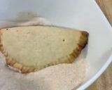 A picture of step 6 of Empanadas with Cola.