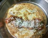 A picture of step 5 of Italian style egg sausage roll.