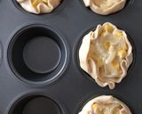 Foto del paso 2 de la receta: Canastitas de choclo cebolla y queso 🧀