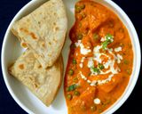 A picture of step 14 of Shahi paneer matar masala.