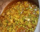 A picture of step 14 of Sohanjna alu matar(Indian horseradish with potato and peas).