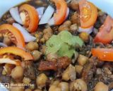 A picture of step 4 of Spicy chole.