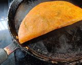 A picture of step 4 of Besan chilla sandwich.