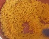 A picture of step 3 of Moong halwa surprise with custard & cookies.