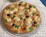 صورة لخطوة 1 من وصفة خبز الجبن🧀 والزيتون مع سلطة جرجير🥗