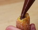 A picture of step 9 of Chocolate hazelnut churros.
