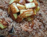 A picture of step 8 of Tomato Paneer Biryani.