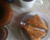 A picture of step 7 of Egg and cheddar toasted sandwich.
