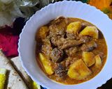 A picture of step 7 of Alu gosht.