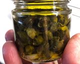 Foto del passaggio 4 della ricetta Boccioli di tarassaco (capperi) sott’olio