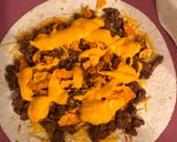 A picture of step 1 of Nacho quesadillas and queso covered Spanish rice.
