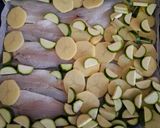 Foto del passaggio 5 della ricetta Branzino al Limone con Patate e Zucchine 🍋🥒