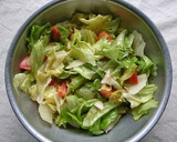A picture of step 3 of Delicatessen-Style Lettuce and Tomato Salad.