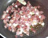 Foto del paso 3 de la receta: Jurel al ajillo con alcachofas salteadas con jamon..,