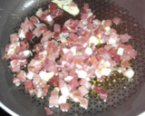 Foto del paso 3 de la receta: Jurel al ajillo con alcachofas salteadas con jamon..,