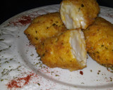 Foto del paso 7 de la receta: Rollitos de pechuga a los 4 quesos