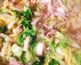 A picture of step 11 of Melt-in-Your-Mouth Napa Cabbage and Pork Udon Hot Pot.